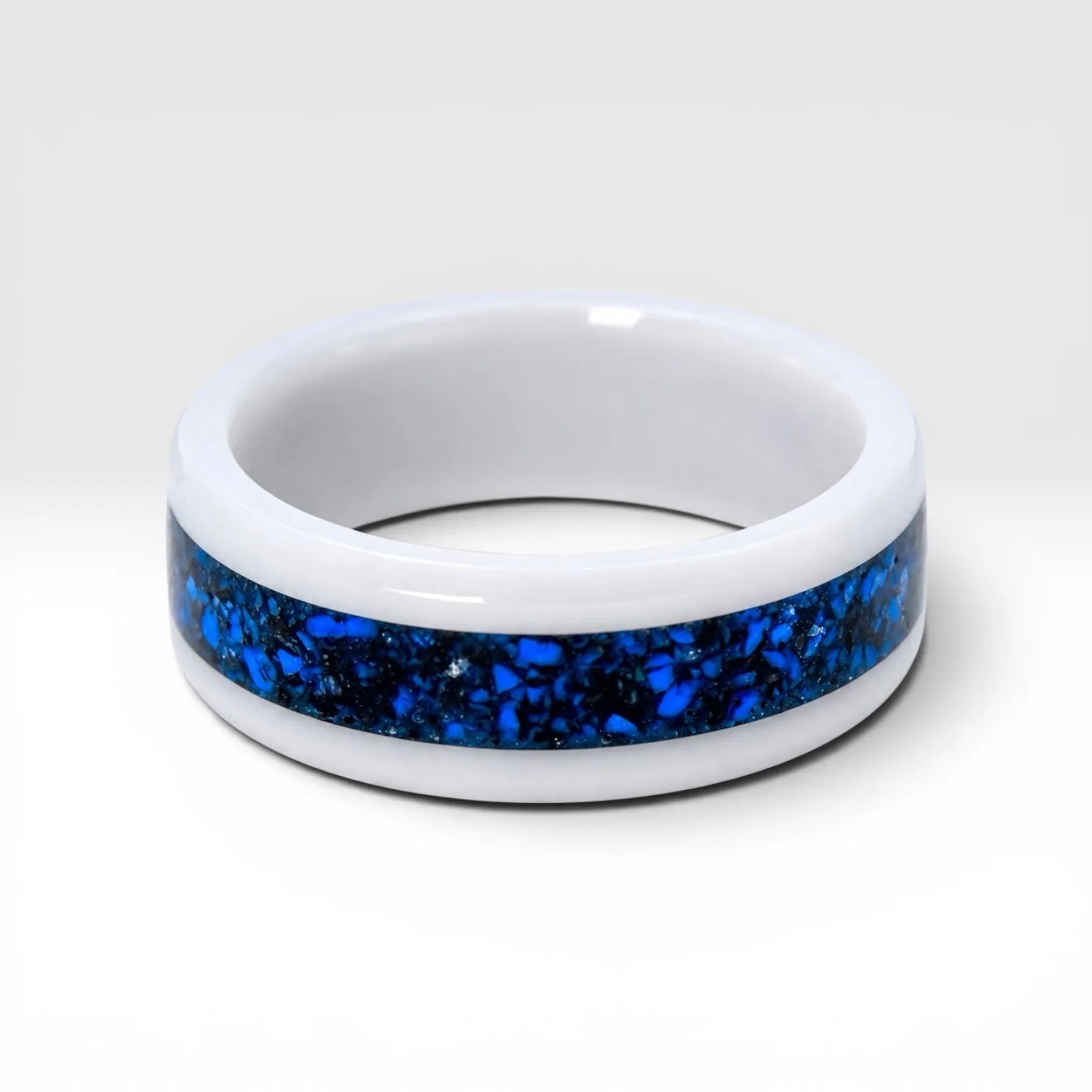 White ceramic ring with blue chrysocolla and silver leaf inlay, smooth polished band with water inspired design