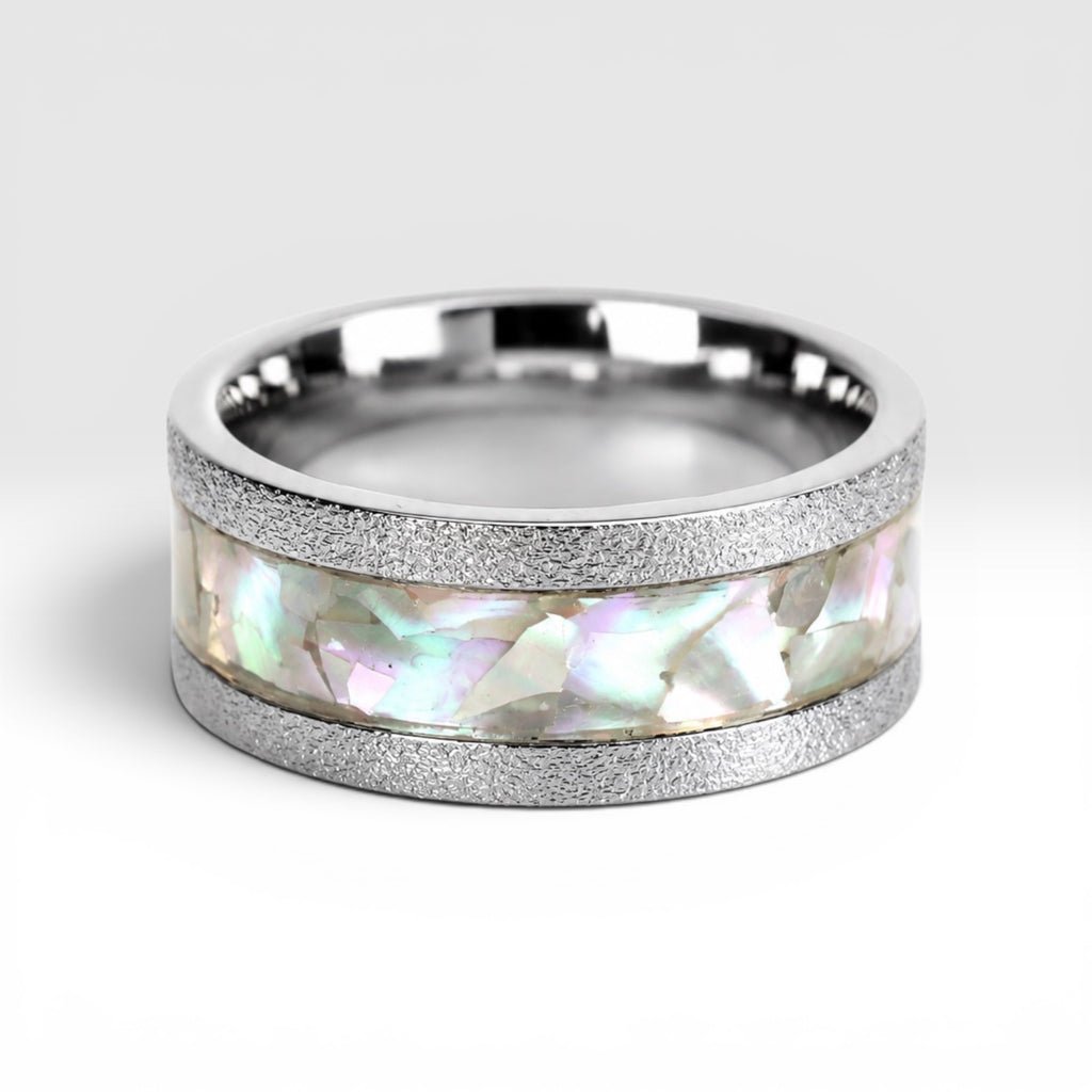 Angled view of Moonveil cobalt ring showcasing luminous mother of pearl inlay and frosted textured finish.