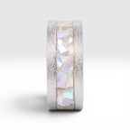 Close-up detail of genuine mother of pearl inlay displaying natural iridescence within the Moonveil cobalt ring.