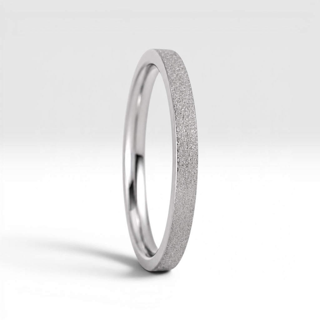 Órbita Luz 2mm stackable ring with frosted finish, luminous surface, handcrafted in Utah