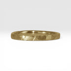 Órbita Roca 2mm hammered gold stackable ring, flat profile with hand-textured surface, polished interior, made in Utah