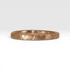 Órbita Roca 2mm hammered rose gold stackable ring, flat profile with hand-textured surface, polished interior, made in Utah