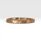 Órbita Roca 2mm hammered rose gold stackable ring, flat profile with hand-textured surface, polished interior, made in Utah