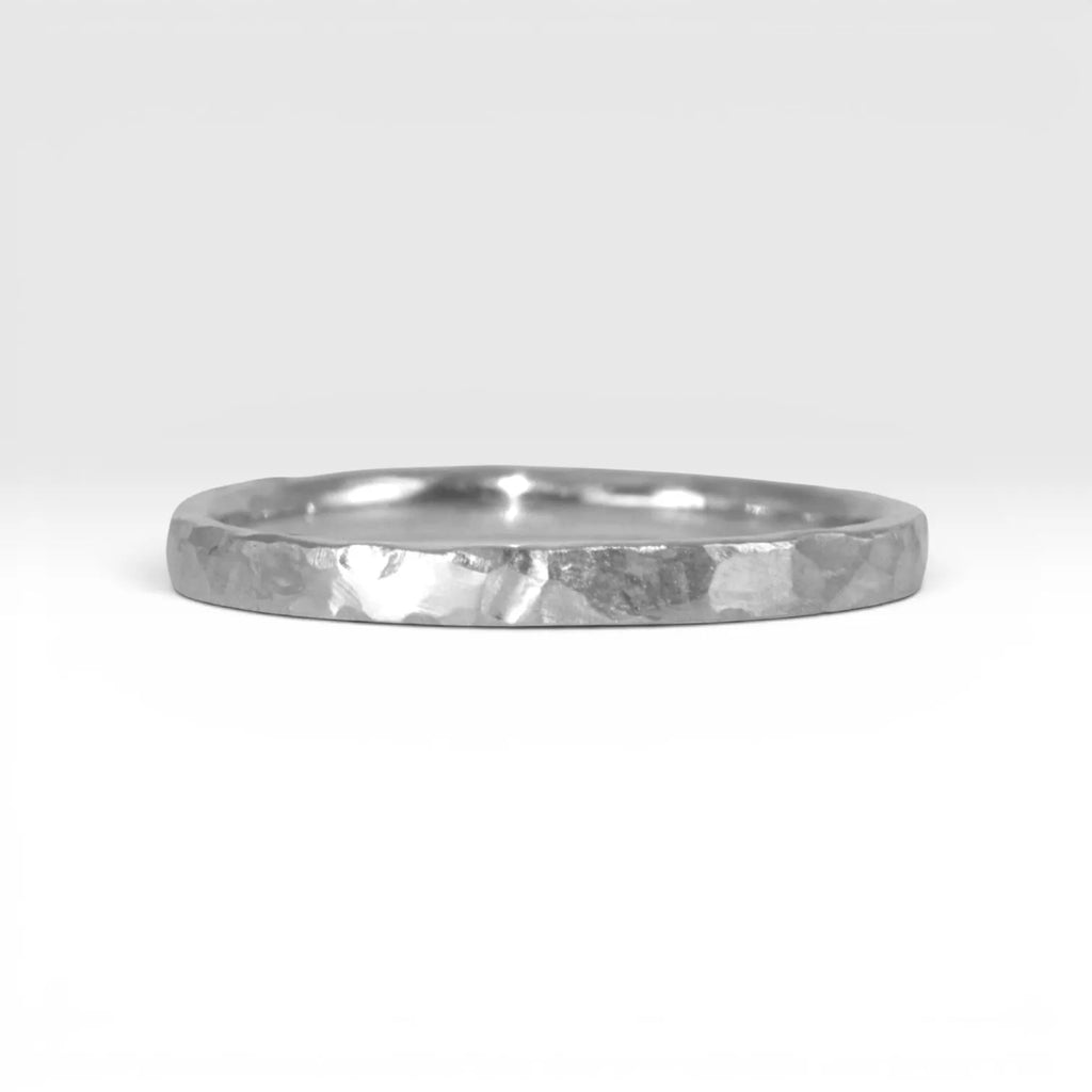 Órbita Roca 2mm hammered sterling silver stackable ring, flat profile with hand-textured surface, polished interior, made in Utah