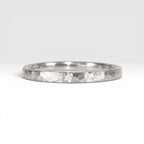 Órbita Roca hammered stacking ring showing raw textured surface and slim 2mm profile
