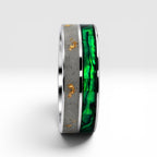 Close-up of titanium ring with paua shell inlay showing iridescent blue, green, and purple tones