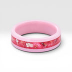 Ceramic ring featuring sea glass fragments and gold leaf with soft pink and teal contrast