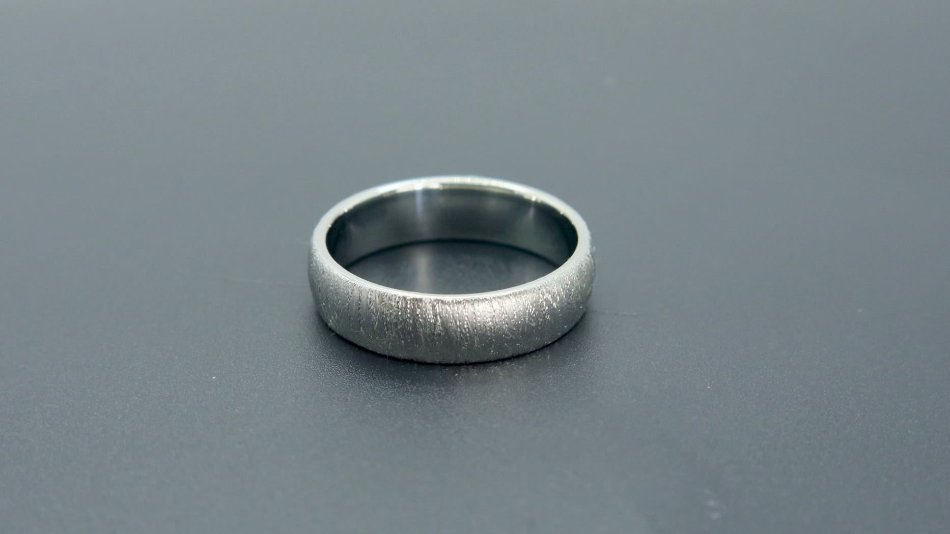 6mm domed men's wedding band with hand-applied diamond burr sparkle finish, polished interior, handcrafted in Utah