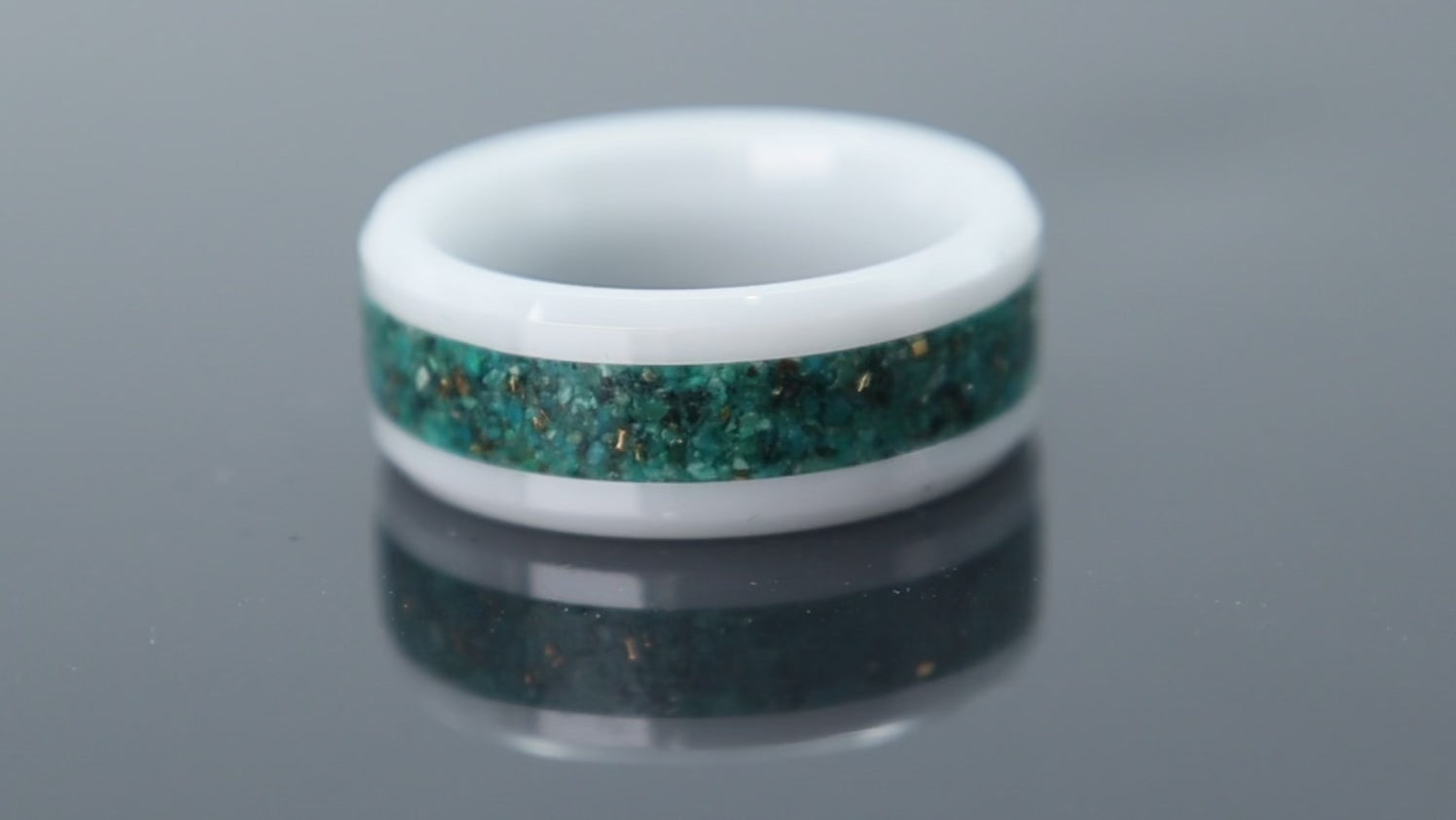 White ceramic ring with chrysocolla and brass inlay