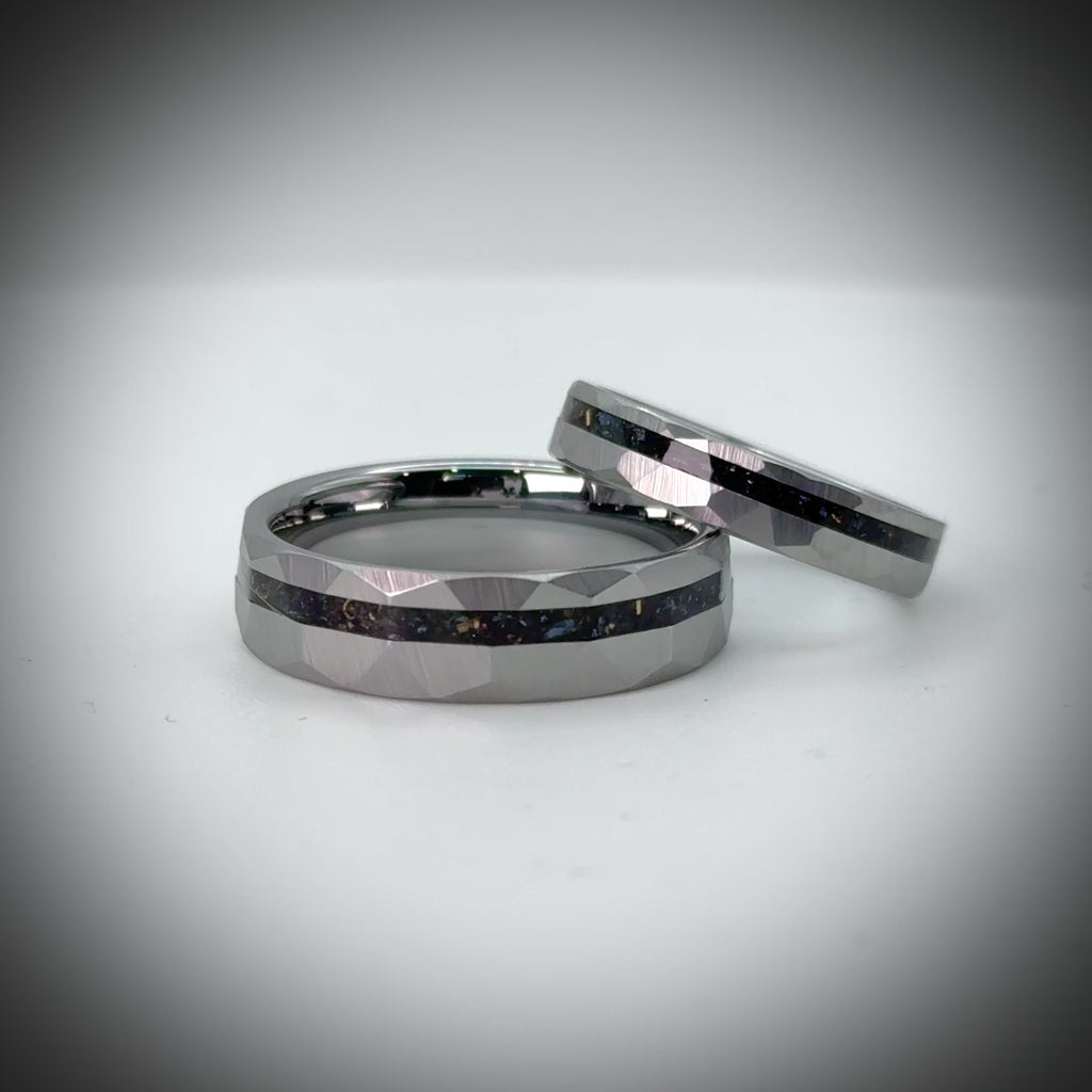 Faceted tungsten wedding ring with black tourmaline and 14k gold inlay in a 2mm offset channel
