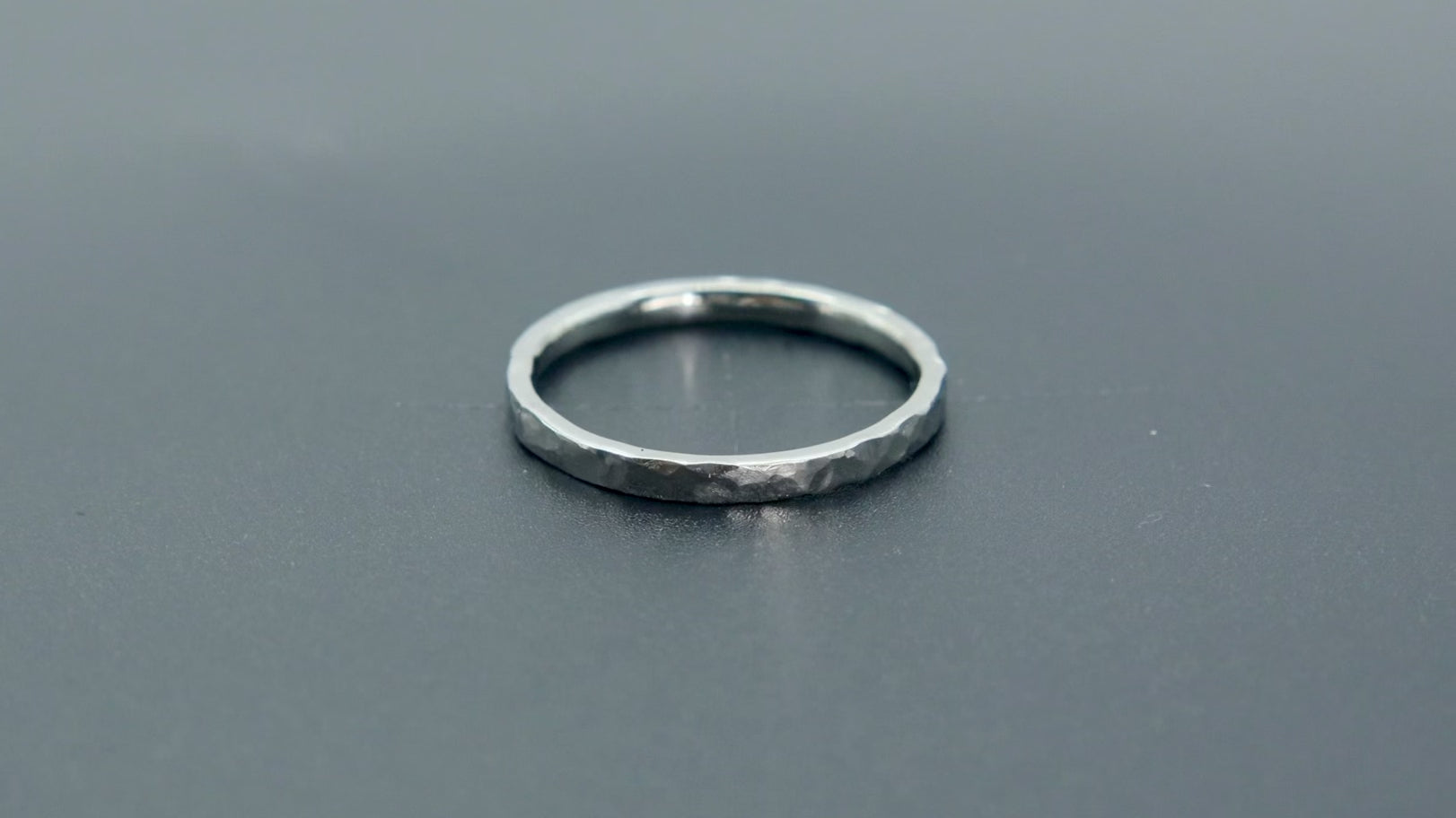 Órbita Roca 2mm hammered stackable ring, flat profile with hand-textured surface, polished interior, made in Utah