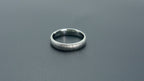 4mm domed women's wedding band with fine vertical diamond burr texture creating a luminous sparkle effect