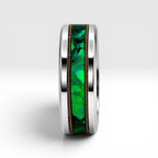 Polished titanium ring with paua abalone inlay and brass guitar strings, handcrafted for everyday wear