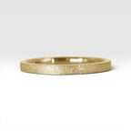 Órbita Luz 2mm gold stackable ring with frosted finish, luminous surface, handcrafted in Utah