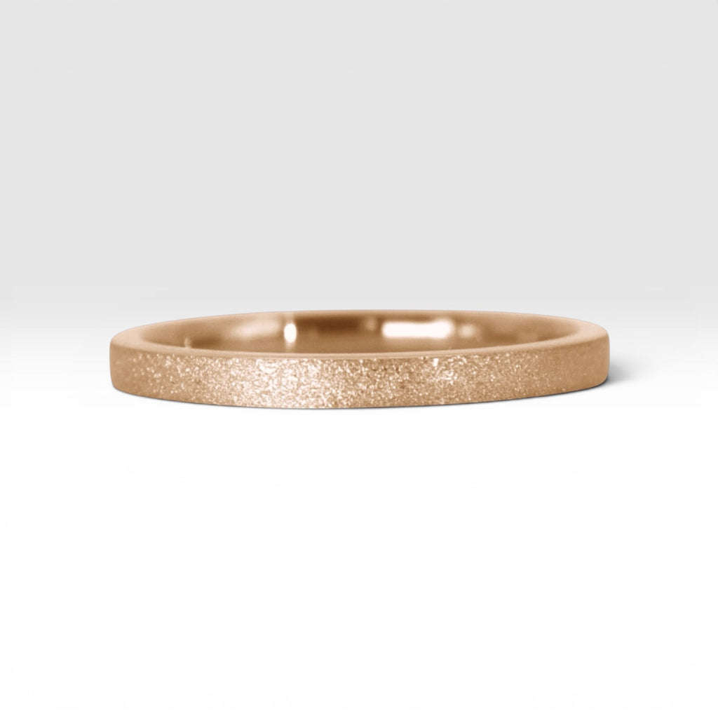 Órbita Luz 2mm rose gold stackable ring with frosted finish, luminous surface, handcrafted in Utah
