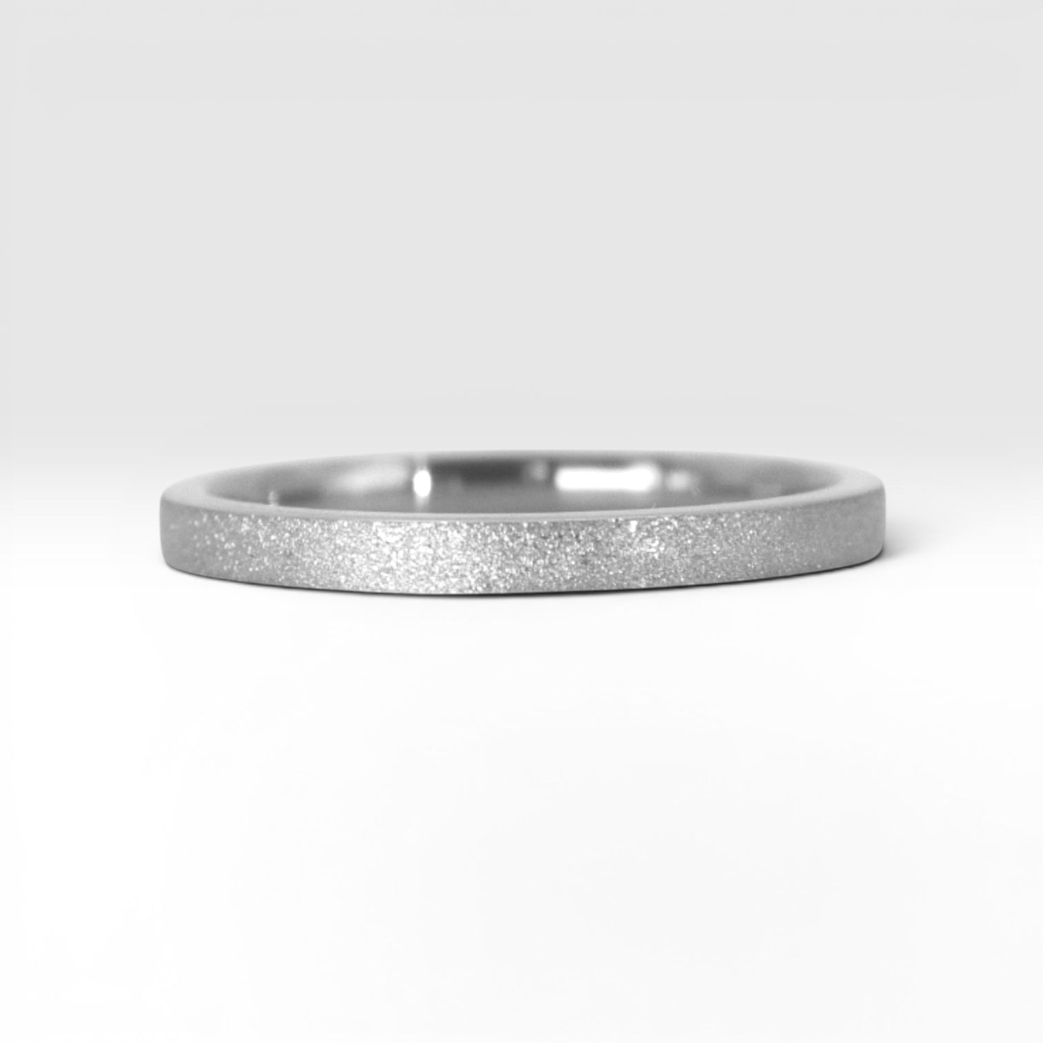 Órbita Luz 2mm Sterling Silver stackable ring with frosted finish, luminous surface, handcrafted in Utah