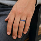 Regalis titanium ring featuring genuine lapis lazuli with natural bronze-colored inclusions and a distressed handcrafted finish.