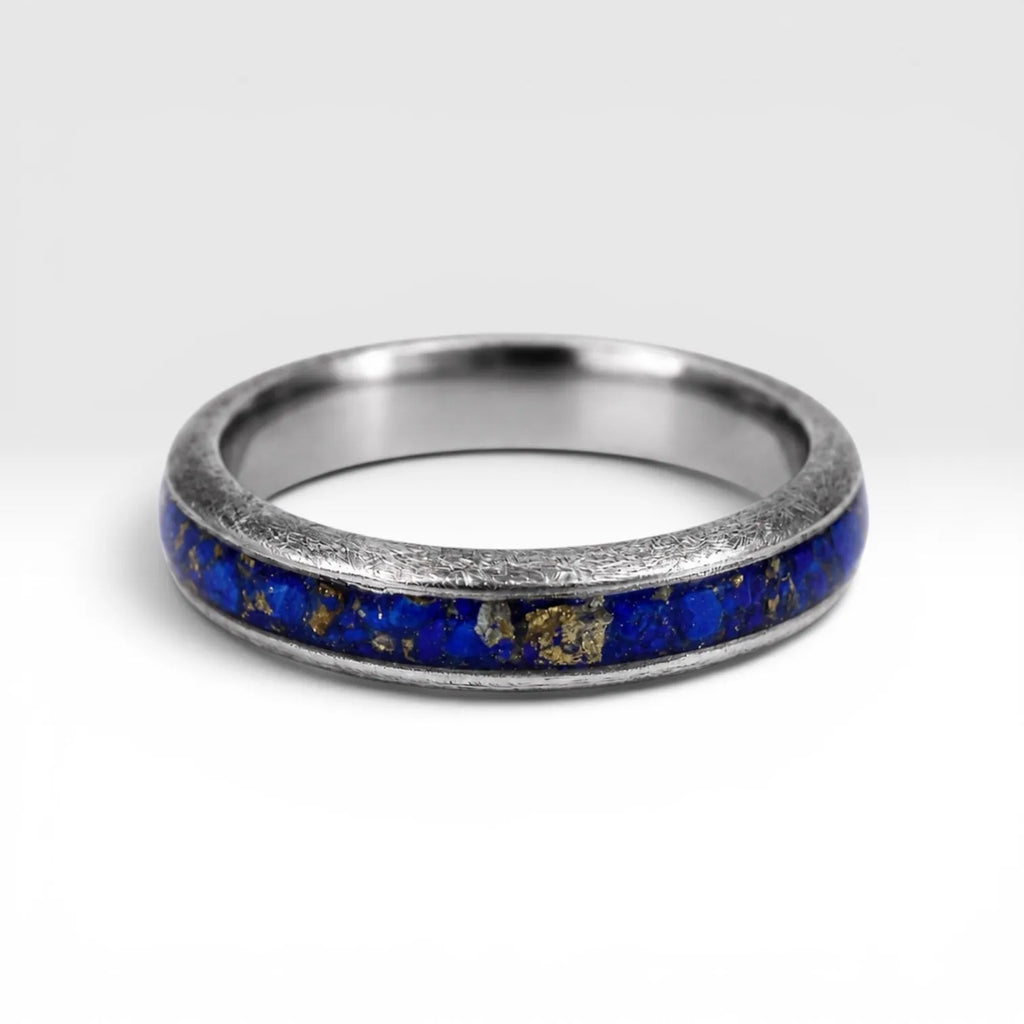 Regalis titanium ring featuring genuine lapis lazuli with natural bronze-colored inclusions and a distressed handcrafted finish.