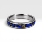 Regalis titanium ring featuring genuine lapis lazuli with natural bronze-colored inclusions and a distressed handcrafted finish.
