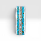 Close-up of tungsten ring with turquoise, mother of pearl and gold leaf showing layered ocean inspired inlay