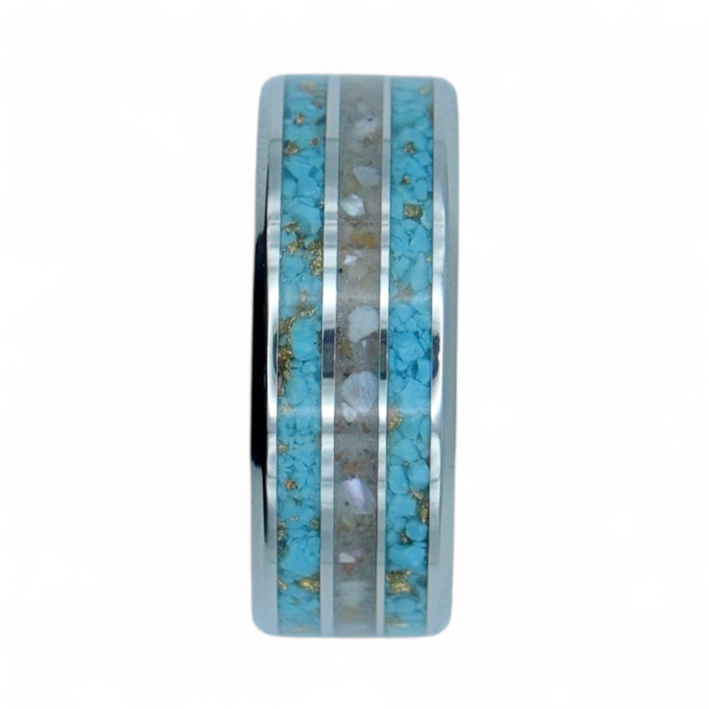 Tungsten band with turquoise, emerald bay sand, mother of pearl and gold leaf creating a natural coastal composition