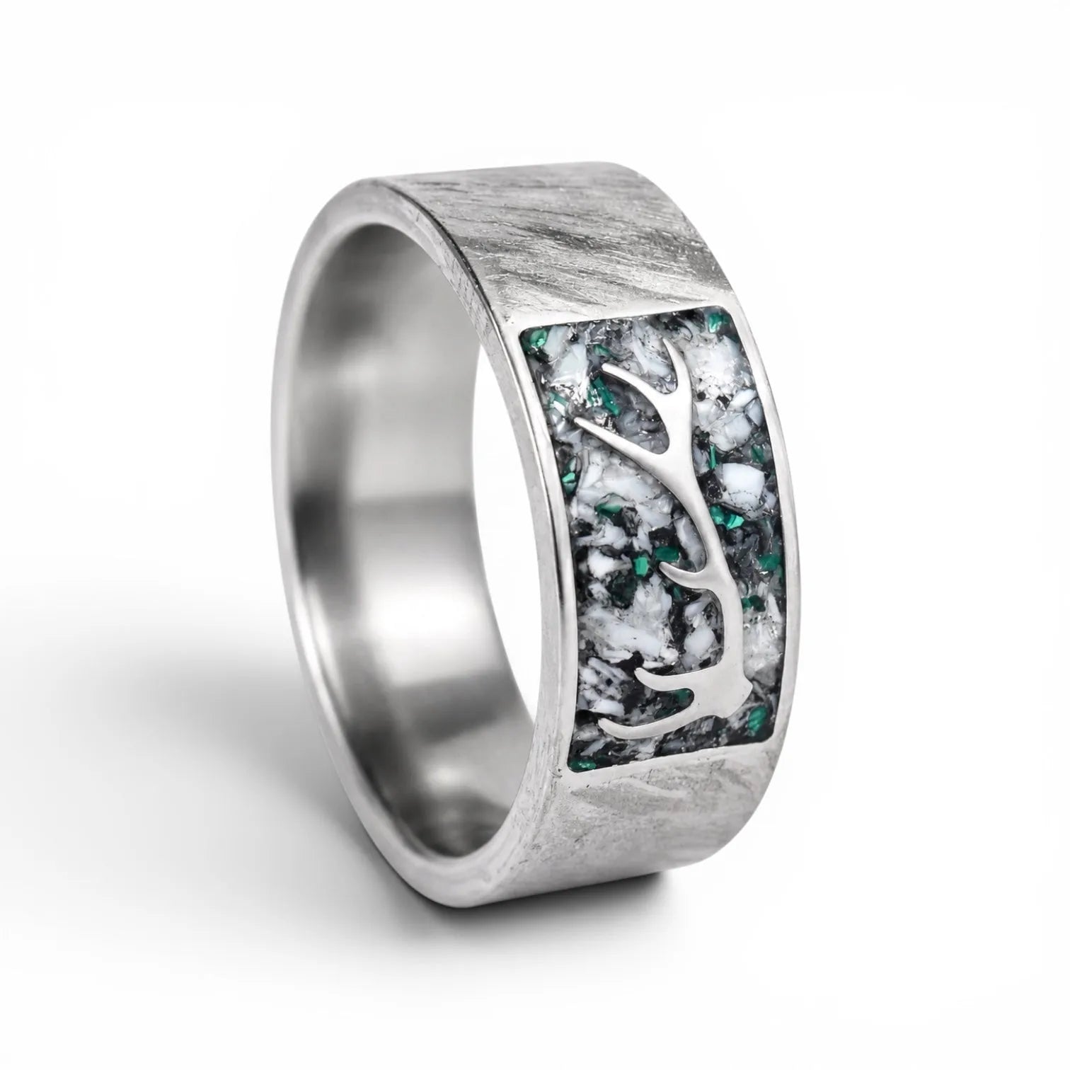 Stagline titanium ring featuring genuine crushed elk tooth, natural malachite inlay, and an antler silhouette with a distressed handcrafted finish.