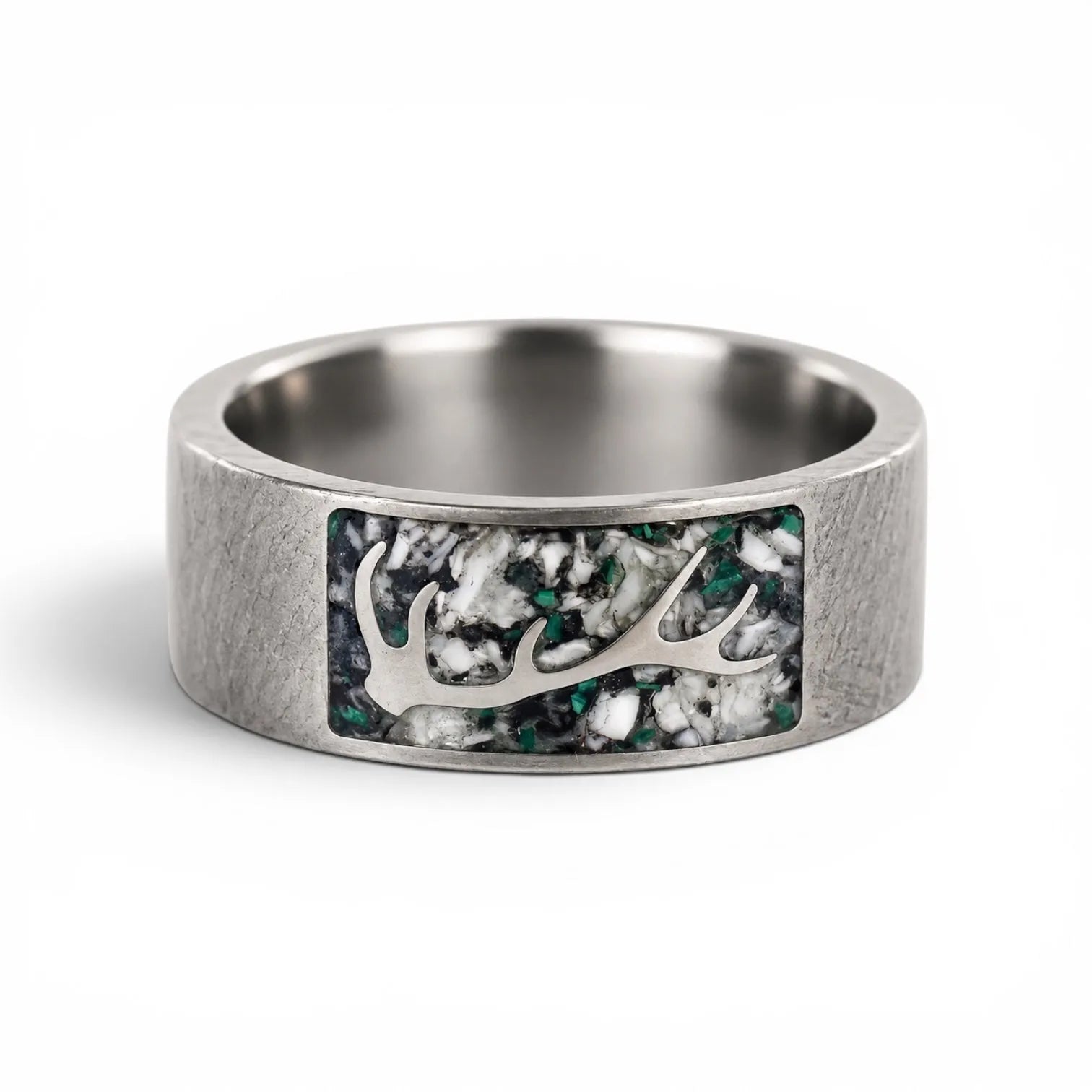 Stagline titanium ring featuring genuine crushed elk tooth, natural malachite inlay, and an antler silhouette with a distressed handcrafted finish.