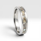 Stellatide titanium ring featuring Bermuda beach sand, Okinawa star sand, and mother of pearl inlay handcrafted by Venus Rings.