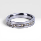 Stellatide titanium ring featuring Bermuda beach sand, Okinawa star sand, and mother of pearl inlay handcrafted by Venus Rings.