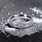Stellatide titanium ring featuring Bermuda beach sand, Okinawa star sand, and mother of pearl inlay handcrafted by Venus Rings.