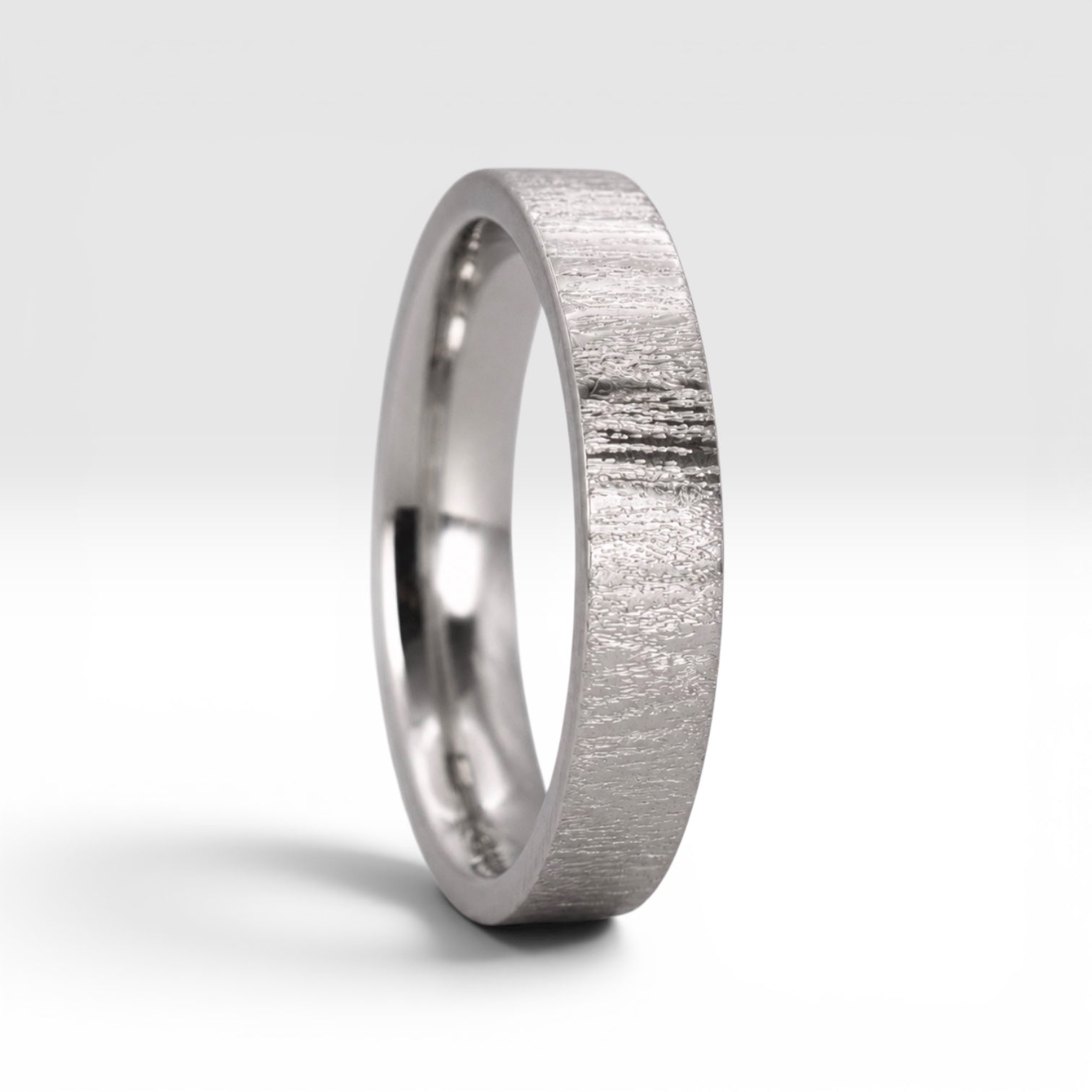 4mm wedding band for women with vertical bamboo-inspired hand-scored texture, minimalist comfort fit design