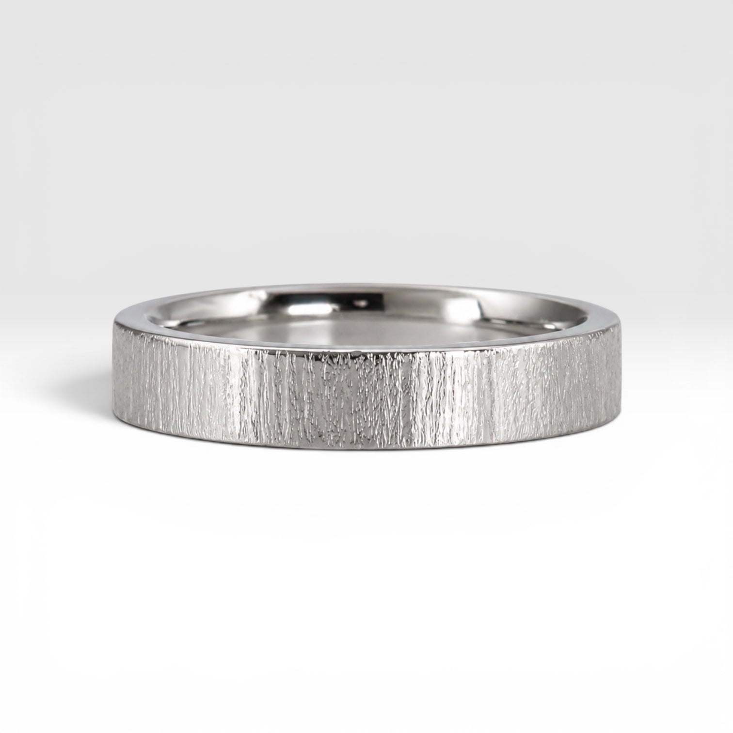 4mm wedding band for women with vertical bamboo-inspired hand-scored texture, minimalist comfort fit design