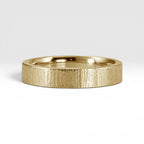 4mm wedding band for women with vertical bamboo-inspired hand-scored texture, minimalist comfort fit design
