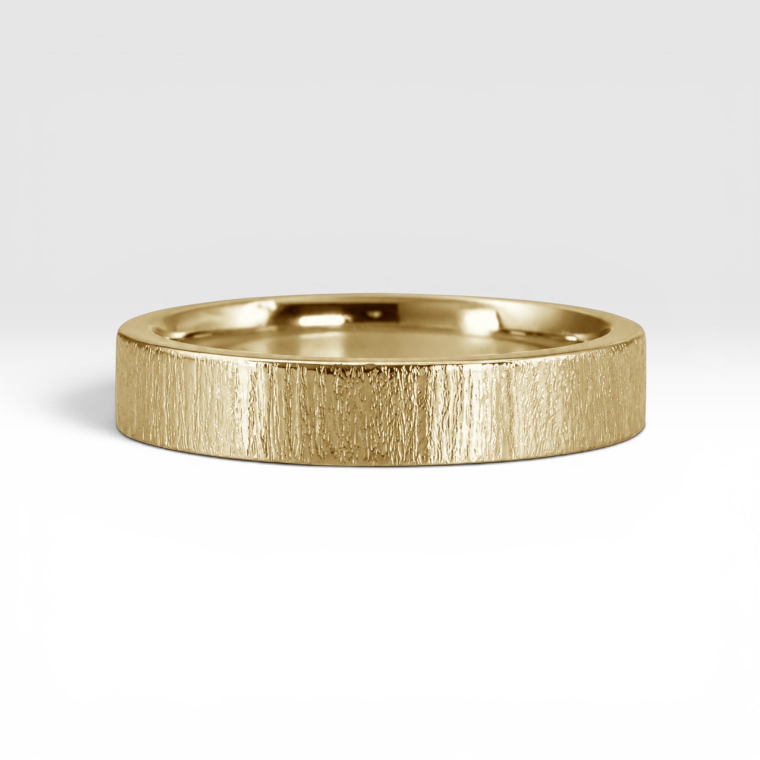 4mm wedding band for women with vertical bamboo-inspired hand-scored texture, minimalist comfort fit design