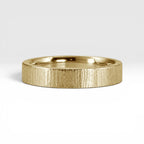 4mm wedding band for women with vertical bamboo-inspired hand-scored texture, minimalist comfort fit design