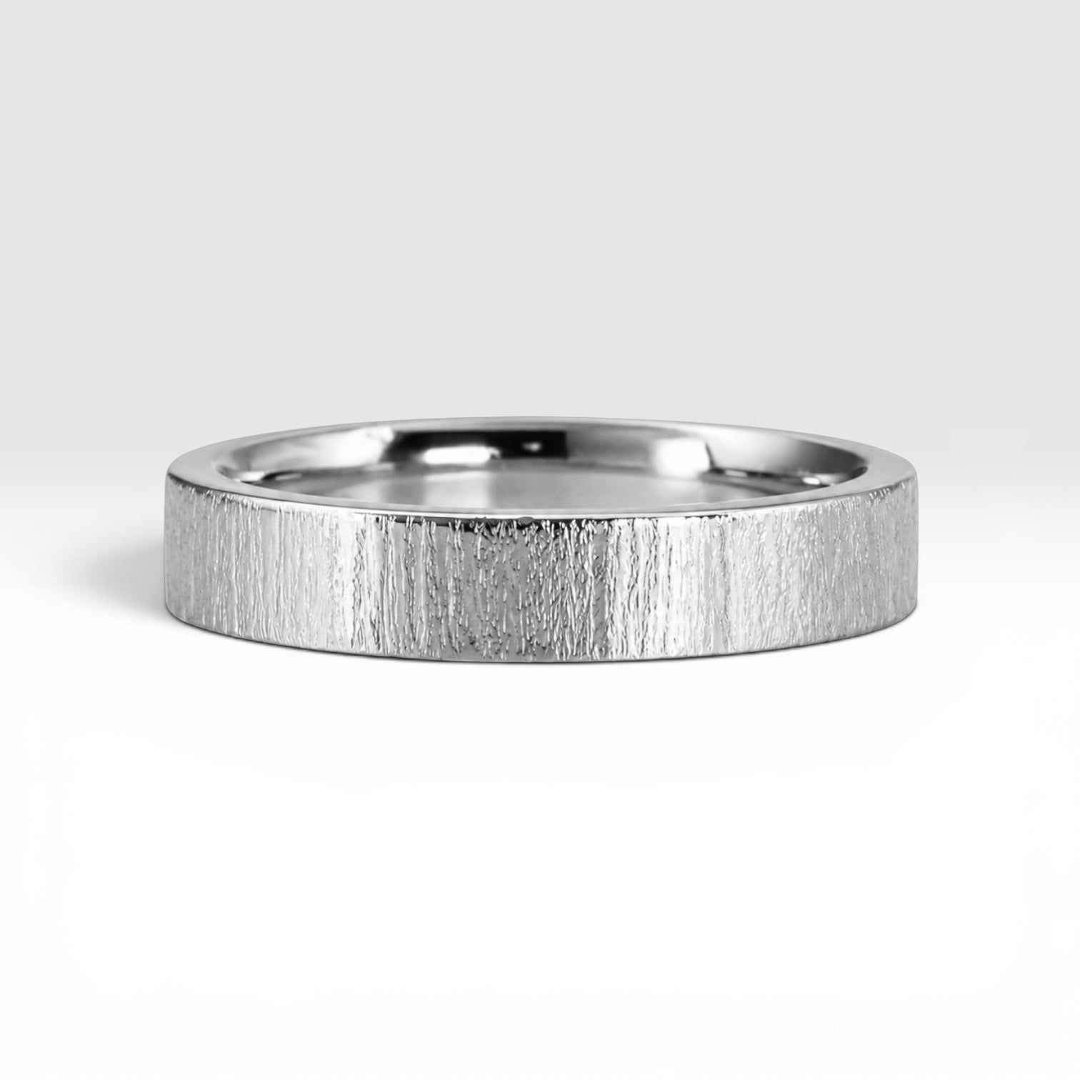 4mm wedding band for women with vertical bamboo-inspired hand-scored texture, minimalist comfort fit design