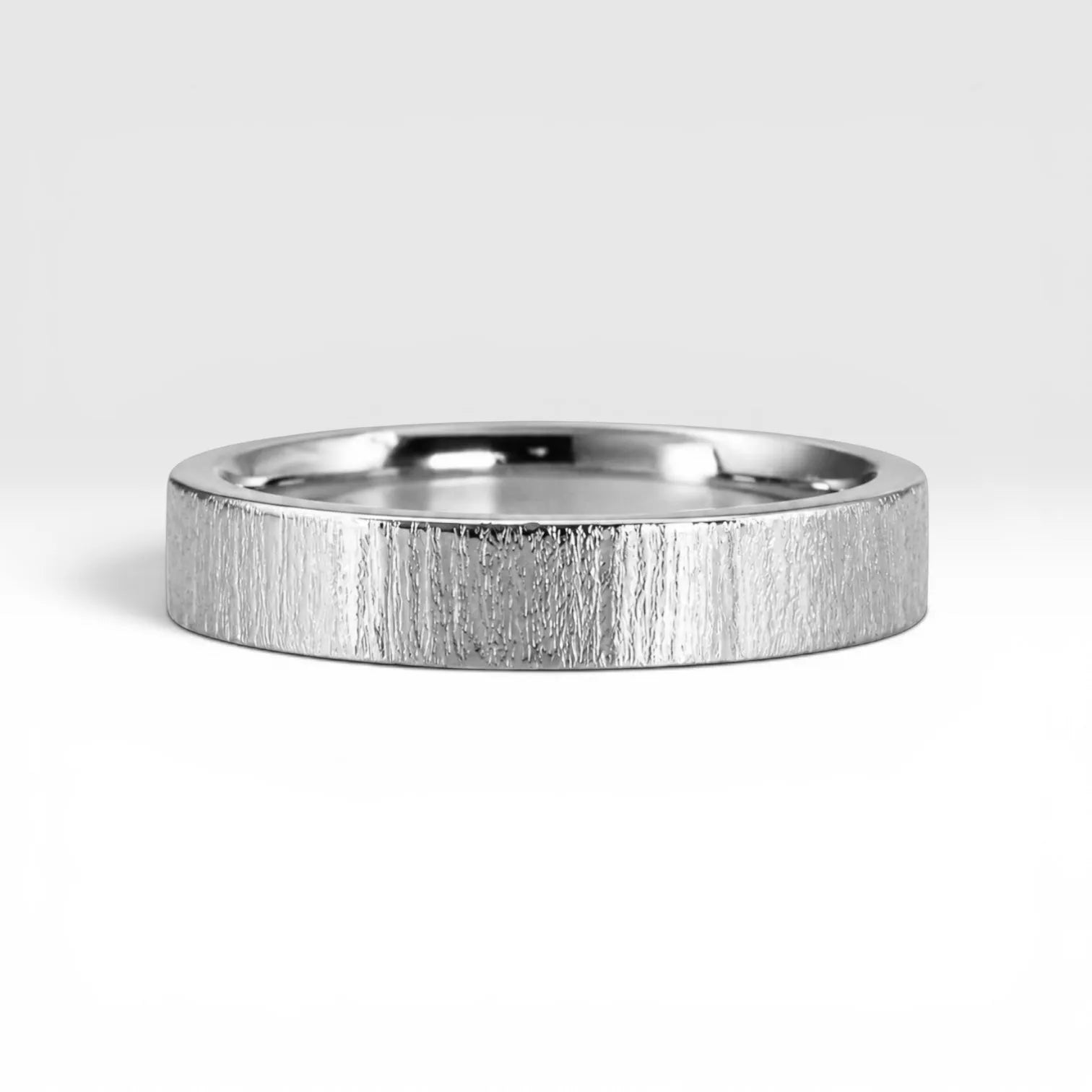 4mm wedding band for women with vertical bamboo-inspired hand-scored texture, minimalist comfort fit design