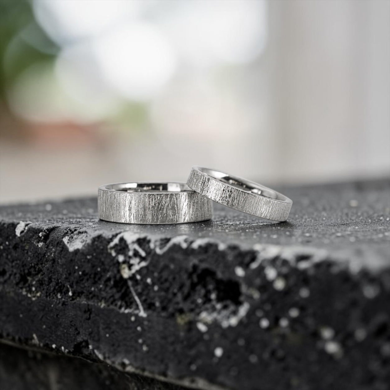 Matching wedding band set with hand-scored bamboo texture finish, 6mm his band and 4mm hers band, handcrafted in Utah