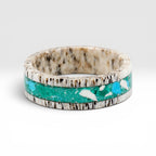 Tidehorn deer antler ring featuring a crushed Larimar inlay with vibrant Caribbean blue tones and natural antler texture.