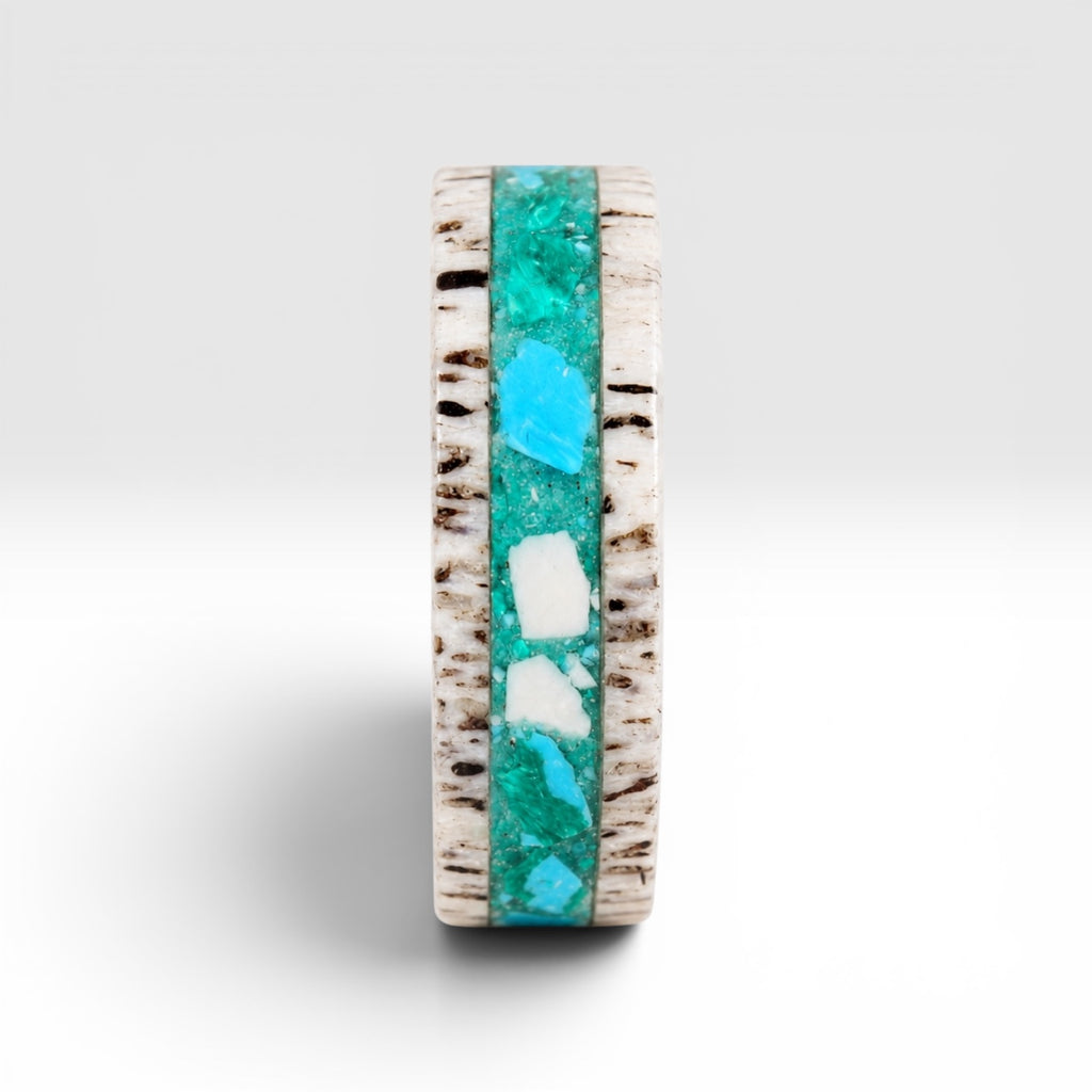 Tidehorn deer antler ring featuring a crushed Larimar inlay with vibrant Caribbean blue tones and natural antler texture.