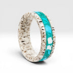 Tidehorn deer antler ring featuring a crushed Larimar inlay with vibrant Caribbean blue tones and natural antler texture.
