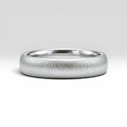 4mm domed sterling silver women's wedding band with fine vertical texture creating a luminous sparkle effect
