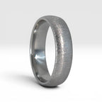  4mm domed women's wedding band with fine vertical texture creating a luminous sparkle effect