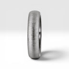 4mm domed women's wedding band with fine vertical texture creating a luminous sparkle effect