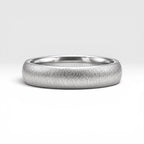 4mm domed women's wedding band with fine vertical texture creating a luminous sparkle effect