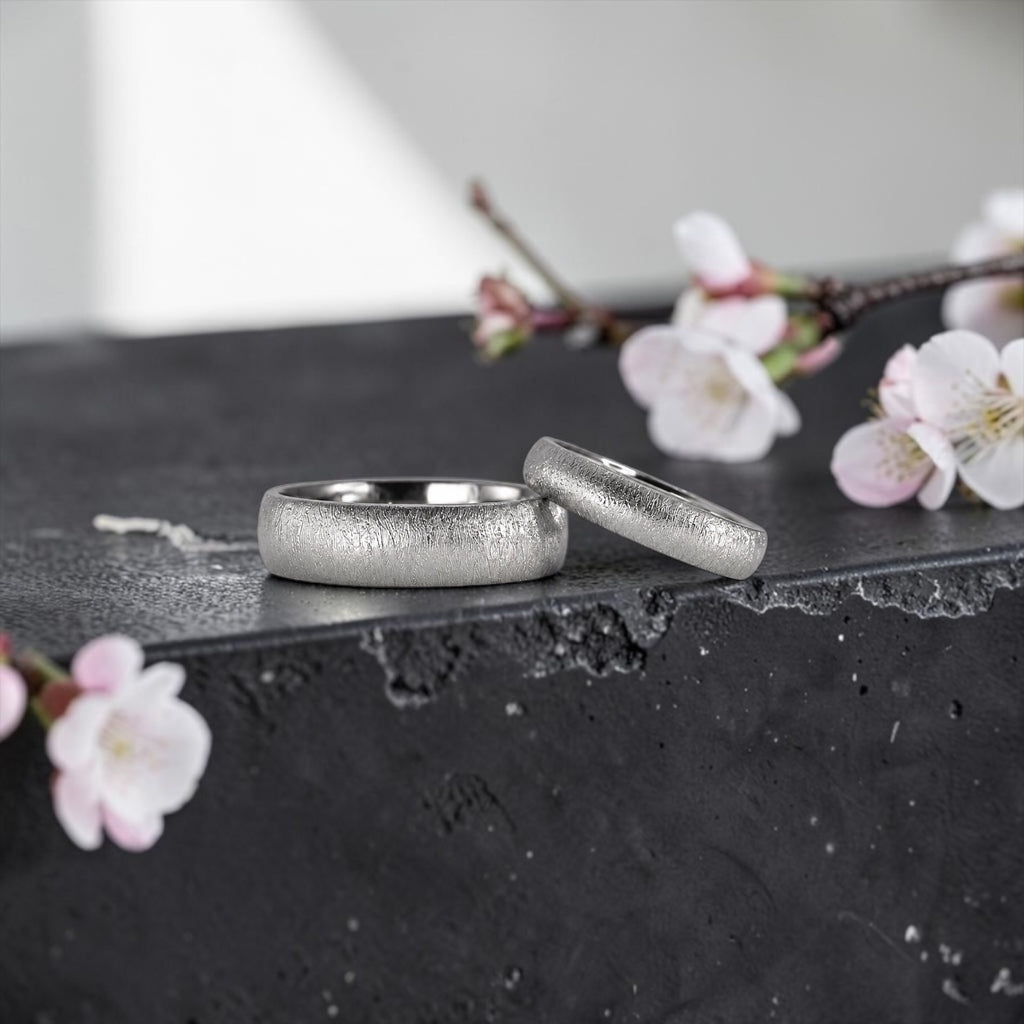 Matching domed wedding band set, 6mm his and 4mm hers, with sparkle finish, handcrafted in Utah