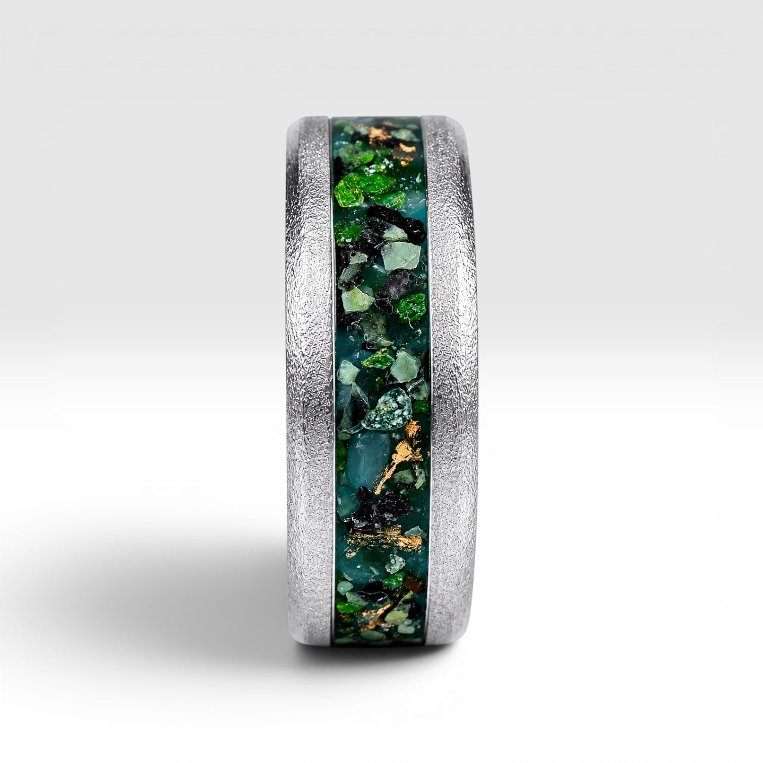 Verdantis titanium ring featuring genuine nephrite jade, brass shavings, and a frosted handcrafted finish by Venus Rings.