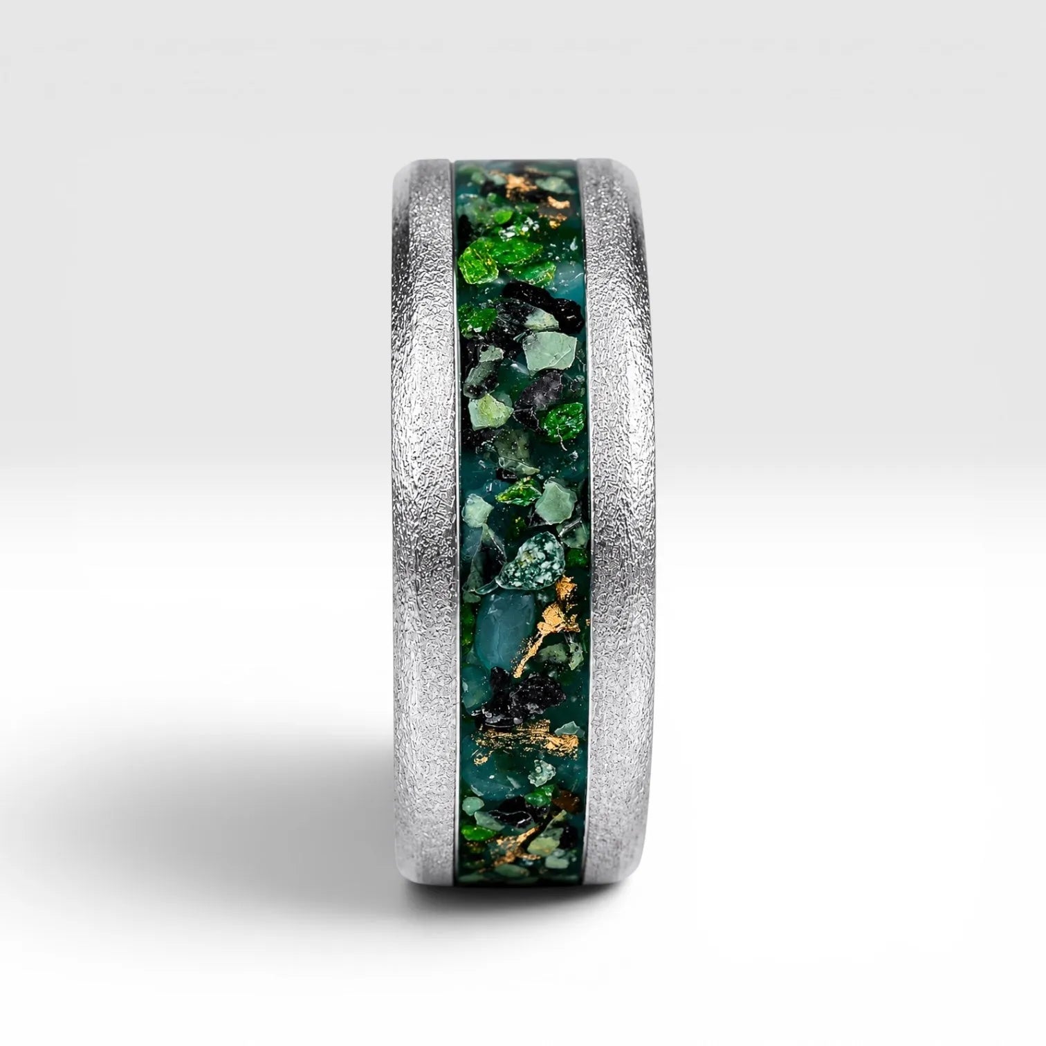 Verdantis titanium ring featuring genuine nephrite jade, brass shavings, and a frosted handcrafted finish by Venus Rings.