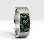 Veridian titanium ring featuring genuine nephrite jade and brass shavings in a modern rectangular inlay with a satin finish.
