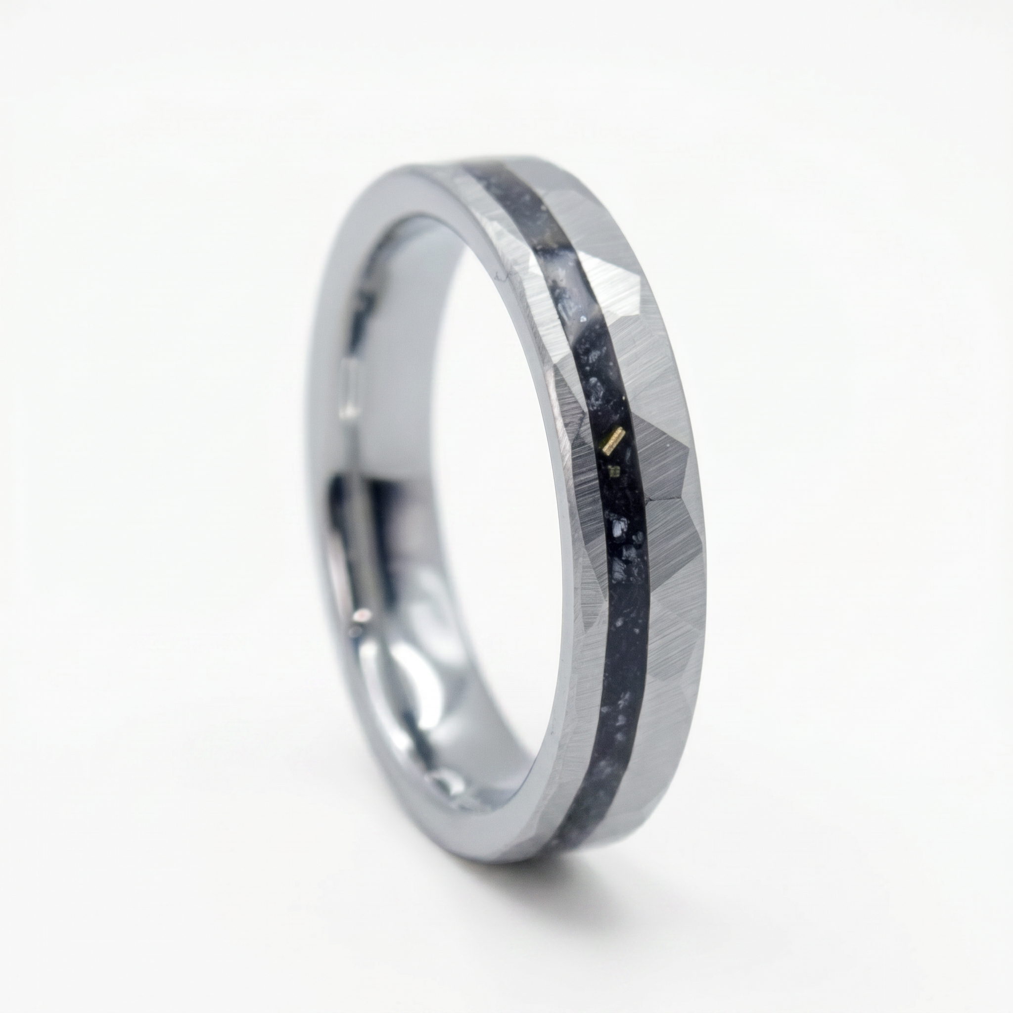 Slim tungsten wedding ring with black tourmaline and gold inlay, faceted finish with refined elegant design